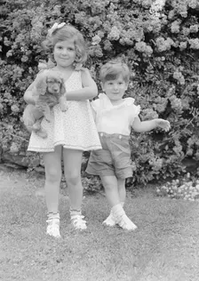 Javits, Benjamin, children of, with dog, standing outdoors, 1933 July. Creator: Arnold Genthe