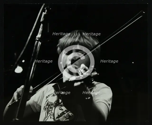 Jazz violinist Christian Garrick playing at The Stables, Wavendon, Buckinghamshire. Creator: Denis Williams.