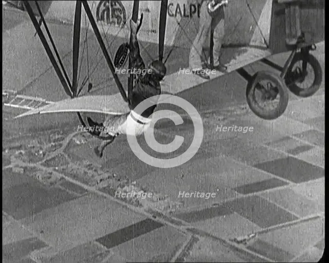 Jazz Musicians Playing from the Wing of a Biplane in the Air, 1921. Creator: British Pathe Ltd.