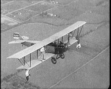 Jazz Musicians Playing from the Wing of a Biplane in the Air, 1921. Creator: British Pathe Ltd