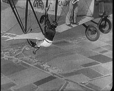 Jazz Musicians Playing from the Wing of a Biplane in the Air, 1921. Creator: British Pathe Ltd