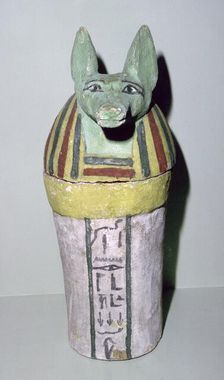 Jackal-headed wooden canopic jar for the storage of organs, Egyptian, 25th Dynasty, c700 BC