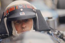 Jackie Stewart at the wheel of a racing car