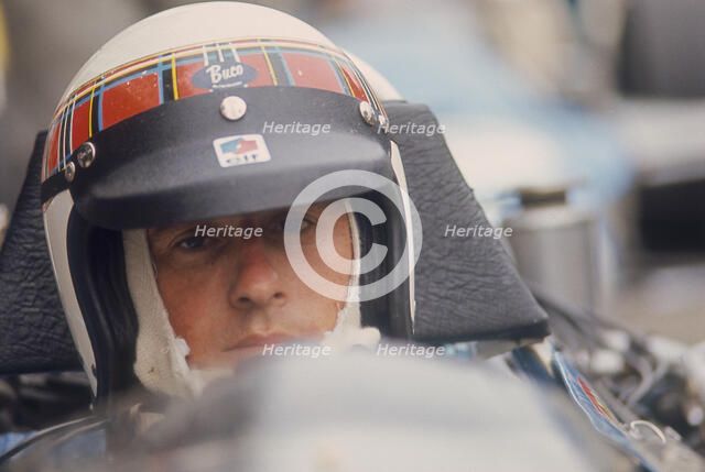 Jackie Stewart at the wheel of a racing car. Artist: Unknown
