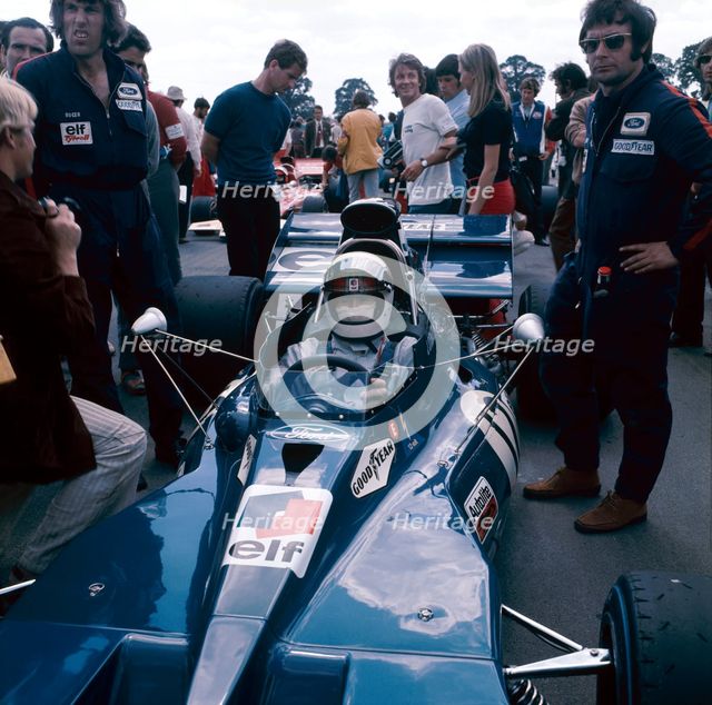 Jackie Stewart at the wheel of a racing car, driving for Tyrrell, c1971-c1973. Artist: Unknown