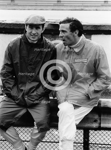 Jackie Stewart on the left, and Jim Clark, 1967. Artist: Unknown