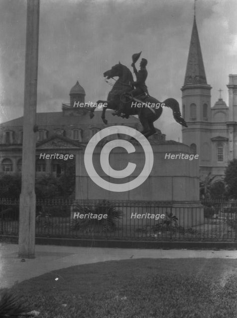 Jackson monument in Jackson Square with the Cabildo and St. Louis Cathedral, New Orleans, c1920-26. Creator: Arnold Genthe.