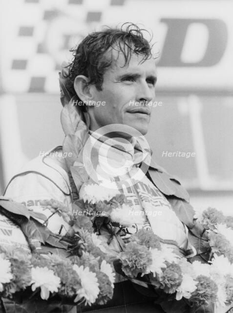 Jacky Ickx after winning the Silverstone 1000km, 1985. Artist: Unknown