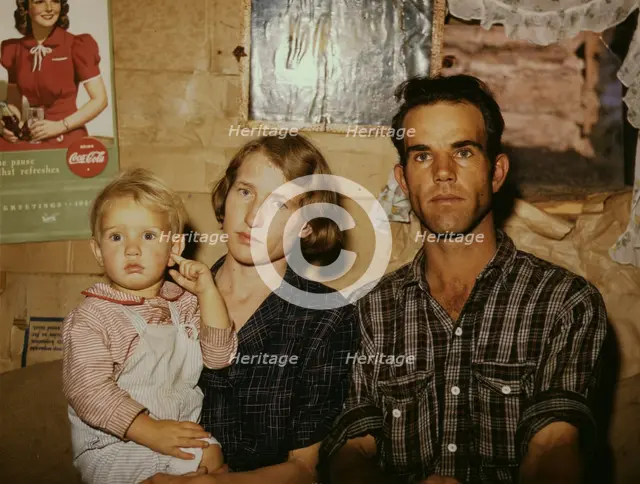 Jack Whinery, homesteader, with his wife and the youngest of his five..., Pie Town, New Mexico, 1940 Creator: Russell Lee.