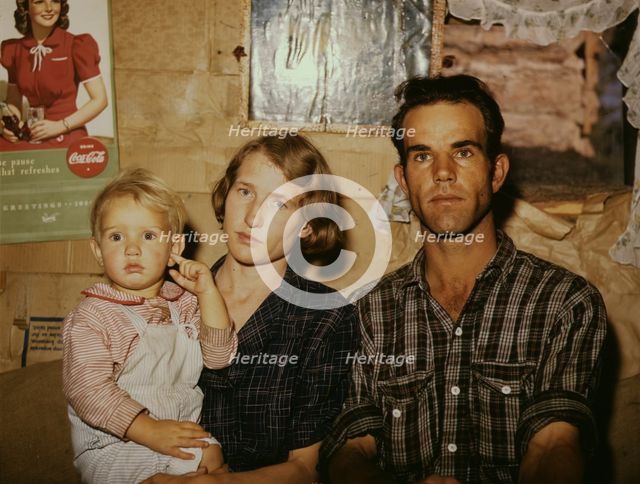 Jack Whinery, homesteader, with his wife and the youngest of his five..., Pie Town, New Mexico, 1940 Creator: Russell Lee.