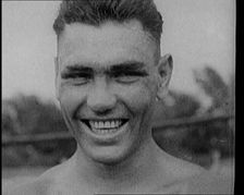 Jack Dempsey Grimacing for the Camera, 1921. Creator: British Pathe Ltd