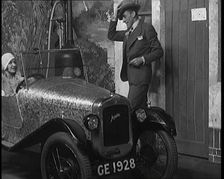 Jack Hulbert Climbing Into a Car, 1920s. Creator: British Pathe Ltd