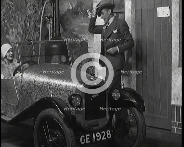 Jack Hulbert Climbing Into a Car, 1920s.  Creator: British Pathe Ltd.