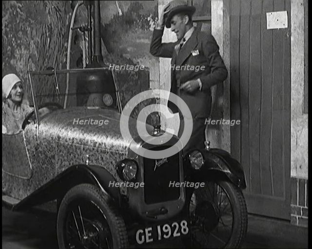 Jack Hulbert Climbing Into a Car, 1920s.  Creator: British Pathe Ltd.