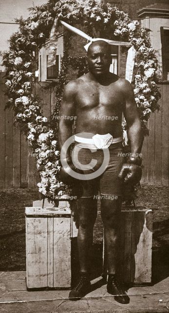 Jack Johnson, American boxer, 1910. Creator: Unknown.