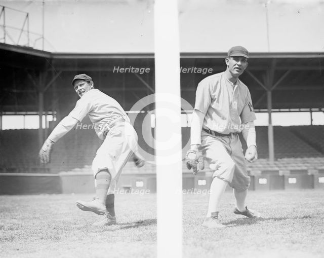 Jack Quinn & Jim Vaughn wearing partial 1909 uniforms, New York, AL (baseball), 1910. Creator: Bain News Service.