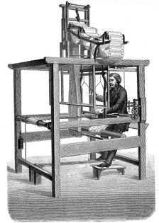 Jacquard loom, with swags of punched cards from which pattern was woven, 1876