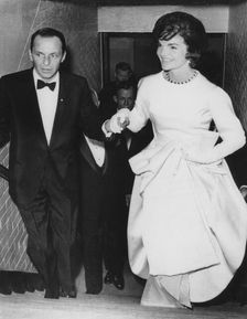 Jacqueline Kennedy with Frank Sinatra at President Kennedy's pre-inauguration gala, 1961. Creator: Unknown