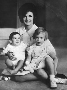 Jacqueline Kennedy with her children Caroline and John, c1961. Creator: Unknown