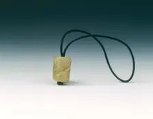 Jade bead with spiralling decoration, Western Zhou dynasty, China, c1100-771 BC. Creator: Unknown
