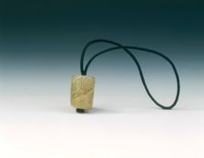 Jade bead with spiralling decoration, Western Zhou dynasty, China, c1100-771 BC. Creator: Unknown