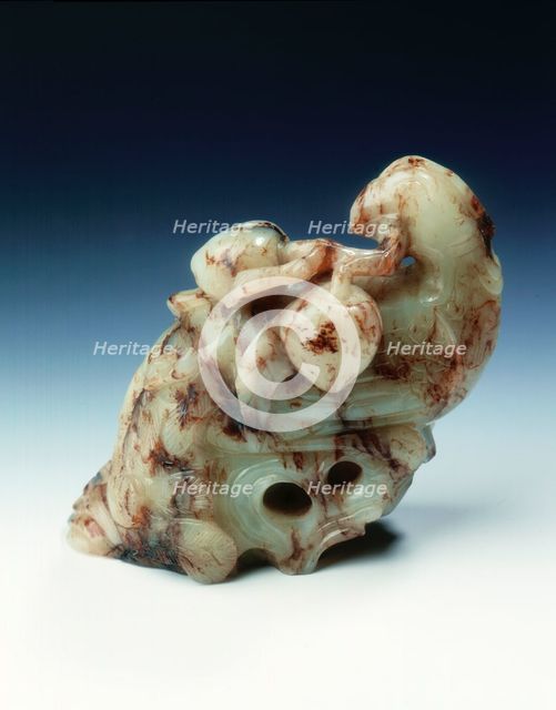 Jade bird with peach on rock, late Ming dynasty, China, 1550-1644. Creator: Unknown.