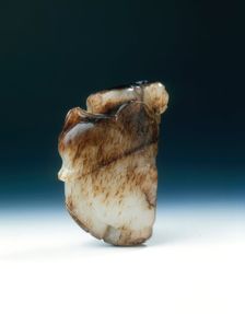Jade boy with lotus leaf and flower, Song or Yuan dynasty, China, 11th-13th century