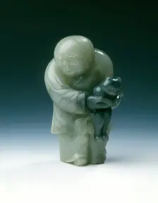 Jade chubby boy holding a black cat, early Ming dynasty or earlier, China, c1300-1550. Creator: Unknown