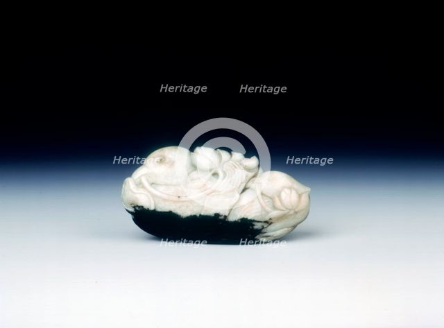 Jade pebble of two mandarin ducks on a bed of waves, late Ming dynasty, China, 1550-1644. Creator: Unknown.
