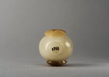 Jade snuff bottle with raised carving of animals, China, Qing dynasty, 1644-1911. Creator: Unknown