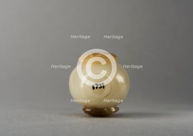 Jade snuff bottle with raised carving of animals, China, Qing dynasty, 1644-1911. Creator: Unknown.