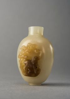 Jade snuff bottle with raised carving of animals, China, Qing dynasty, 1644-1911. Creator: Unknown