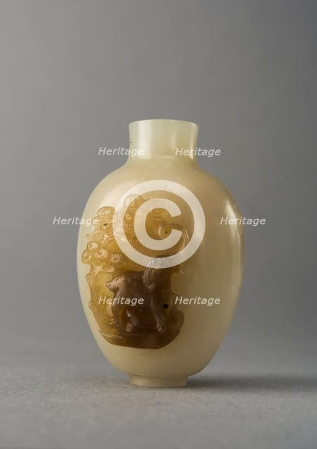 Jade snuff bottle with raised carving of animals, China, Qing dynasty, 1644-1911. Creator: Unknown.
