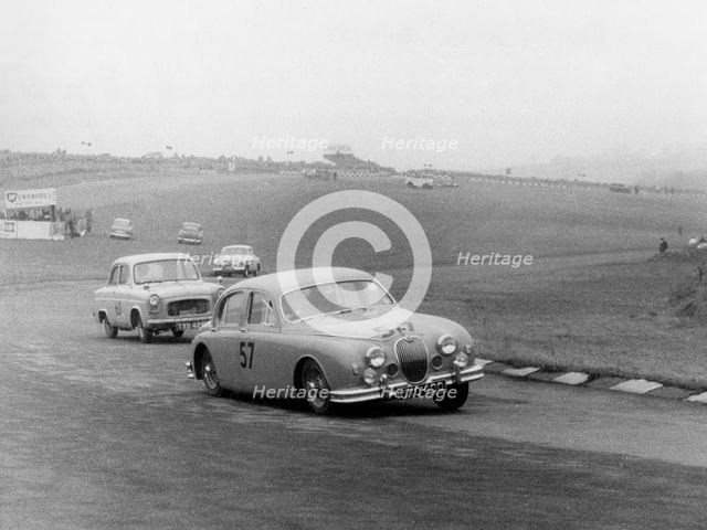 Jaguar 3.4 Mark1 at Brands Hatch 1957. Creator: Unknown.
