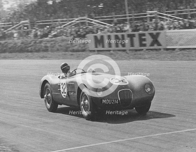Jaguar C type , Duncan Hamilton 1951. Creator: Unknown.