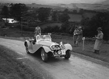 Jaguar SS 100 of Mrs V Hetherington competing in the South Wales Auto Club Welsh Rally, 1937 Artist: Bill Brunell