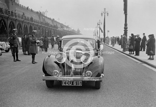 Jaguar SS of Elsie Wisdom at the RAC Rally, Brighton, Sussex, 1939. Artist: Bill Brunell.