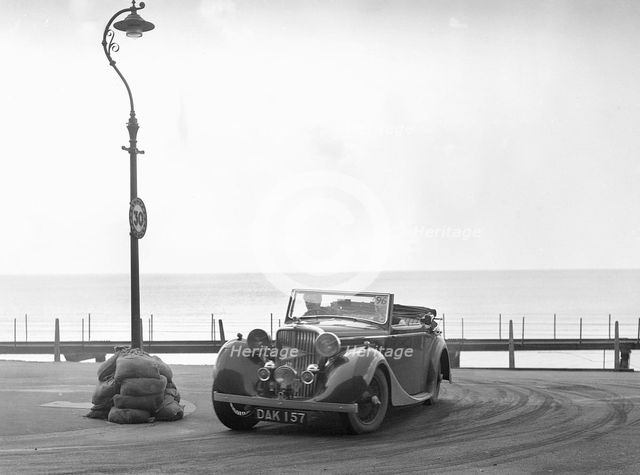 Jaguar SS of RM Proctor at the RAC Rally, Brighton, Sussex, 1939. Artist: Bill Brunell.