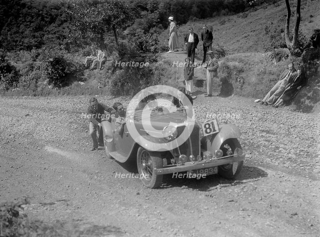 Jaguar SS open 2-seater at the Mid Surrey AC Barnstaple Trial, Beggars Roost, Devon, 1934. Artist: Bill Brunell.