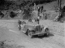 Jaguar SS open 2-seater at the Mid Surrey AC Barnstaple Trial, Beggars Roost, Devon, 1934. Artist: Bill Brunell
