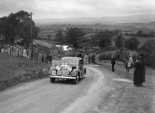 Jaguar SS saloon of DS Hand competing in the South Wales Auto Club Welsh Rally, 1937 Artist: Bill Brunell