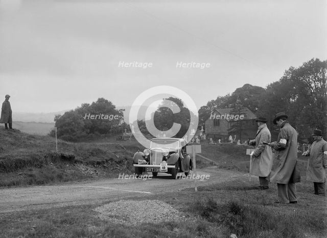 Jaguar SS saloon of HT Lewis competing in the South Wales Auto Club Welsh Rally, 1937 Artist: Bill Brunell.