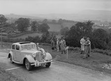Jaguar SS saloon of N Howfield competing in the South Wales Auto Club Welsh Rally, 1937 Artist: Bill Brunell