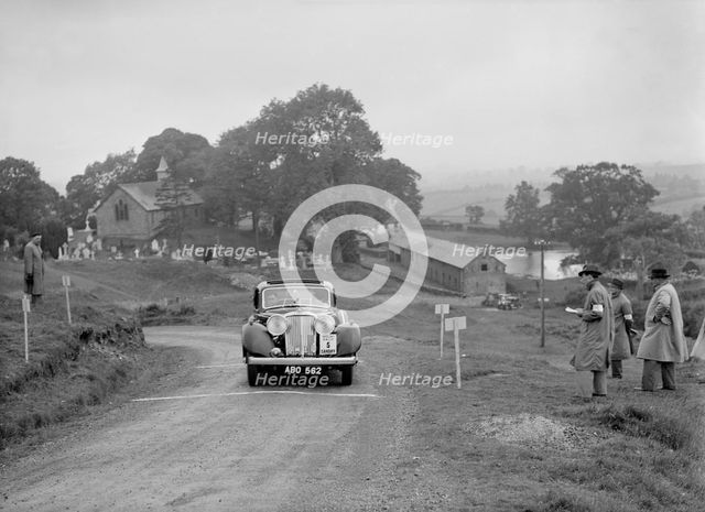 Jaguar SS saloon of SG Davies competing in the South Wales Auto Club Welsh Rally, 1937 Artist: Bill Brunell.