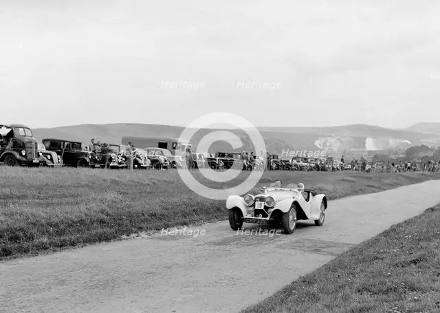 Jaguar SS100 of LJ Simmons competing at the Lewes Speed Trials, Sussex, 1938. Artist: Bill Brunell.
