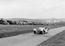 Jaguar SS100 of LJ Simmons competing at the Lewes Speed Trials, Sussex, 1938. Artist: Bill Brunell