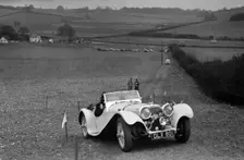 Jaguar SS100 at the Standard Car Owners Club Southern Counties Trial, 1938. Artist: Bill Brunell