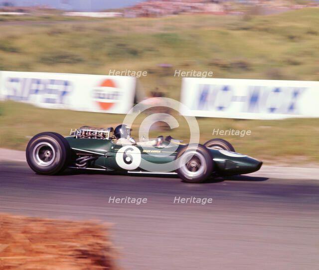 James Clark driving a 1966 Lotus 33 Climax V8. Artist: Unknown.