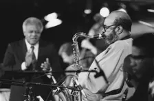 James Moody with Slide Hampton Big Band, North Sea Jazz Festival, Netherlands,1993. Creator: Brian Foskett