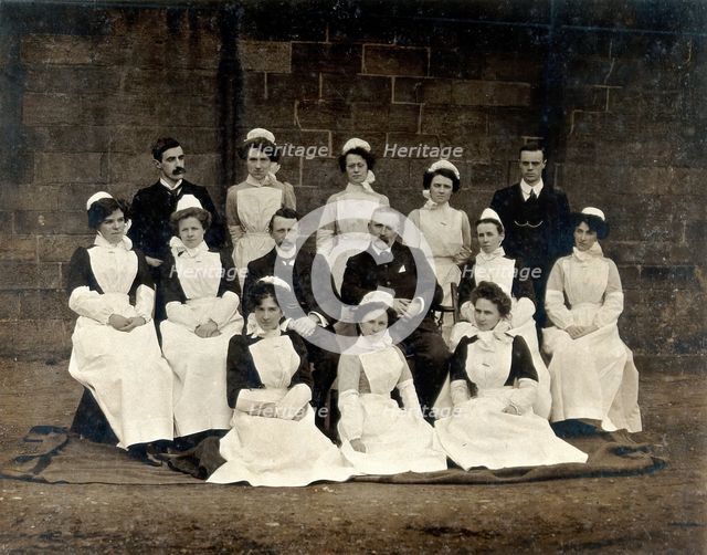 James Rutherford Morison with his staff: three men and ten women, c1900. Creator: Unknown.